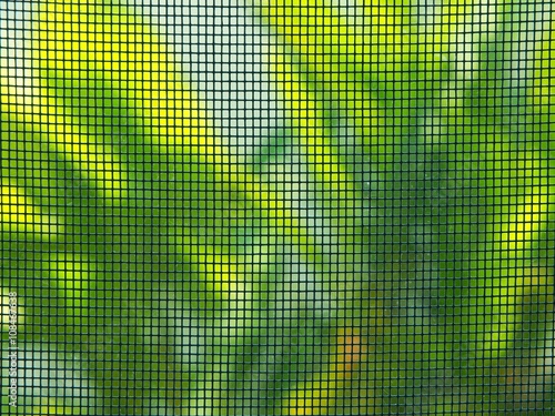 mosquito wire screen with garden background