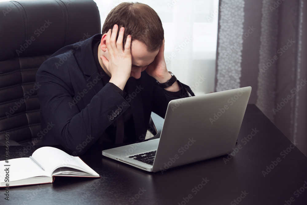 Business man has strong head ache, he weak and unworkable Business man has strong head ache, he weak and unworkable