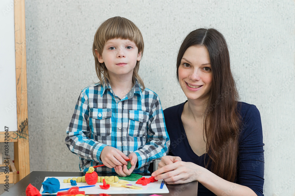 child kid boy and mother play colorful clay child kid boy and mother play colorful clay
