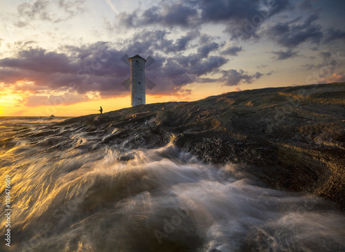 Seascape, lighthouse-windmill, Baltic Sea, Swinoujscie, Poland 