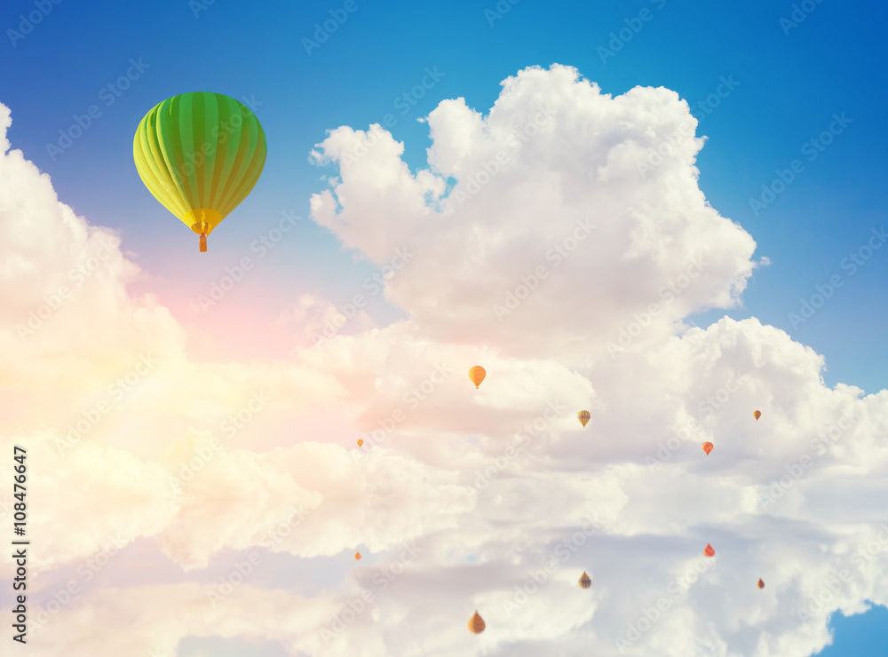 Fototapeta premium colorful hot air balloons flying over water