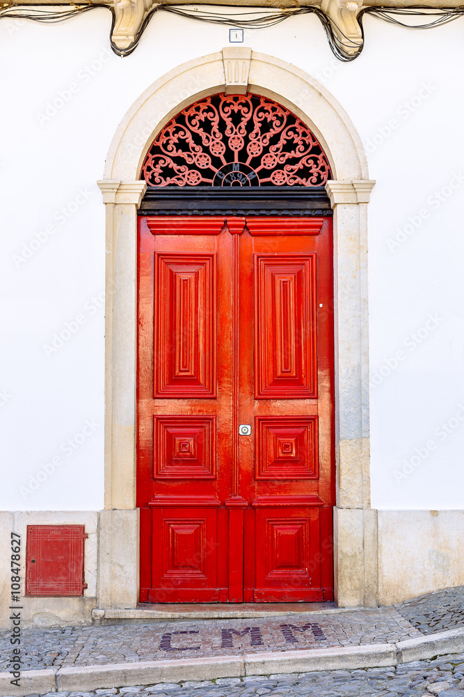 Red door in Mertola, Portugal. Colors of Portugal Series