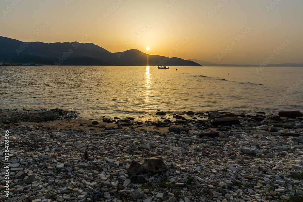 Amazing Sunset on the beach of Thassos town, East Macedonia and Thrace, Greece 