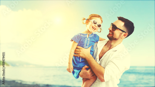 happy family father and child daughter playing and having fun in © JenkoAtaman