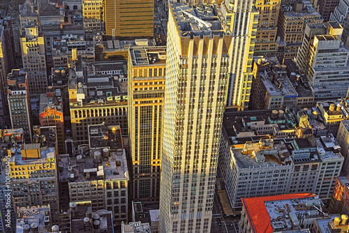 Aerial view from Empire State Building on Skyscrapers at sunset