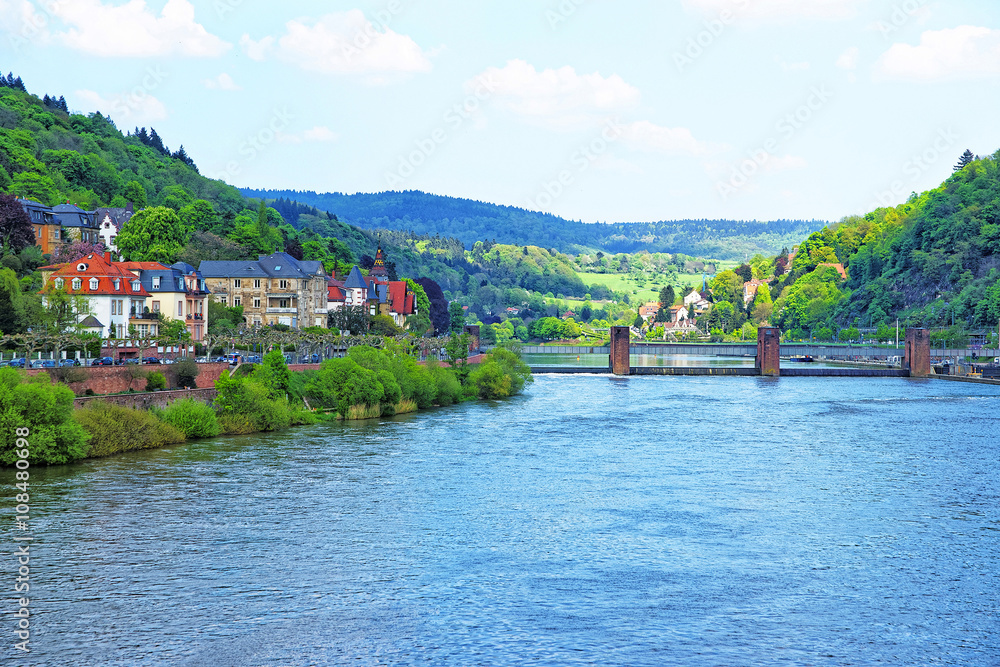 Quay of Neckar river and bridge in Heidelberg in Germany