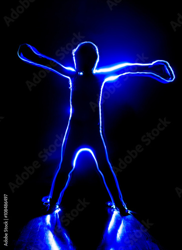 Blue human figure. Speed light painting. Freeze Light.