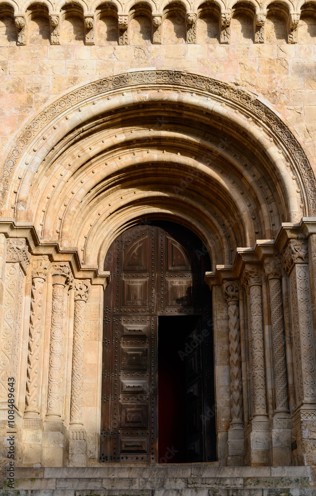 The west entrance of the Old Cathedral of Coimbra, Portugal