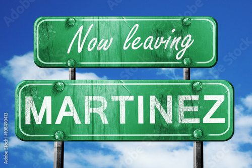 Leaving martinez, green vintage road sign with rough lettering