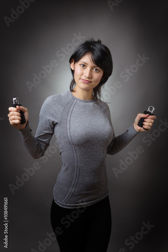 Model using handgrips photo