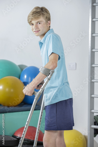 Rehabilitation of young boy walking