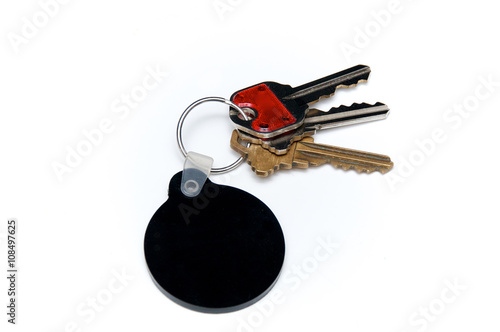 three keys over white with black blank fob photo