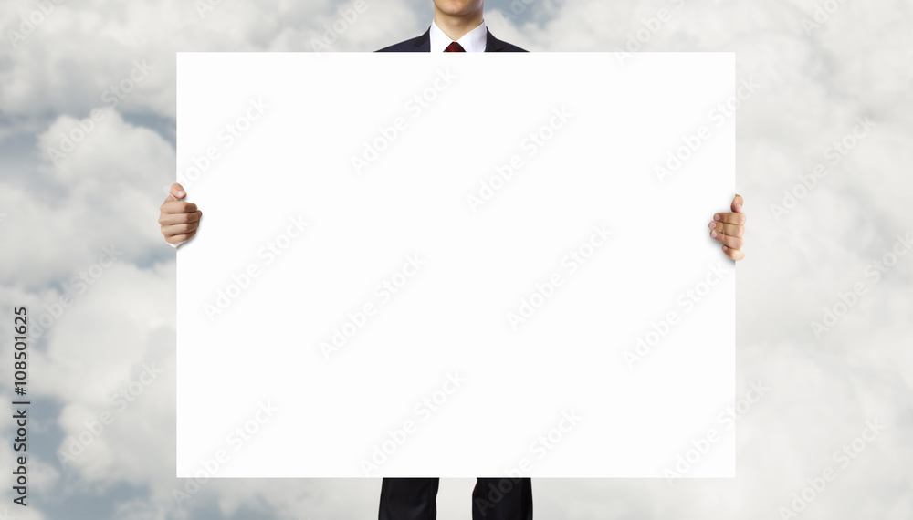 Fototapeta premium Businessman showing empty banner