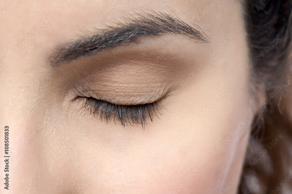 Naklejka premium closed eyed woman