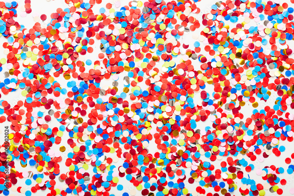 Color circles from paper confetti for decoration on white background