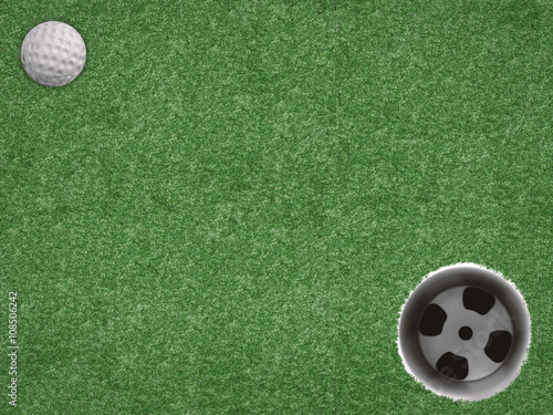top view golf ball with golf cup on green background