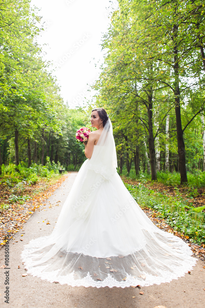 Beautiful wedding bouquet in hands of the bride