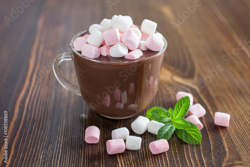 hot chocolate with a souffle in a glass on a table, selective focus