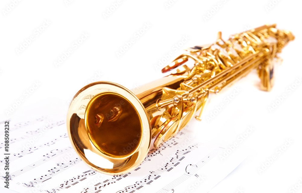 Obraz premium Musical notes and saxophone