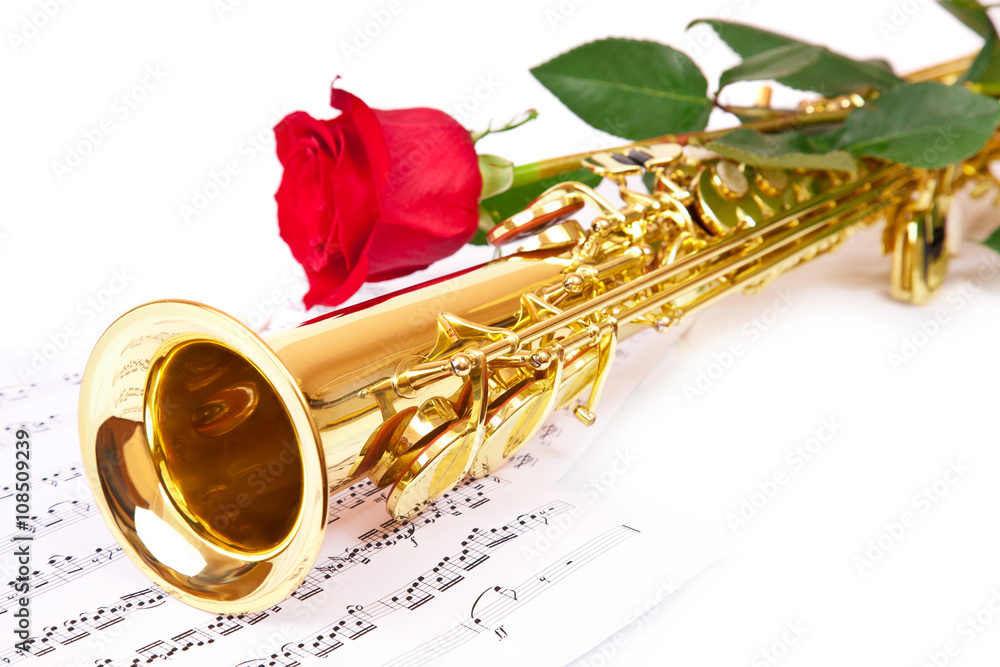 Naklejka premium Musical notes and saxophone