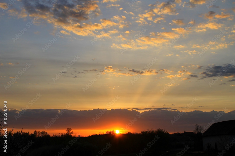 Sunrise above countryside 