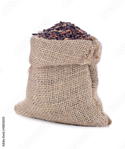 riceberry rice in sack on white background