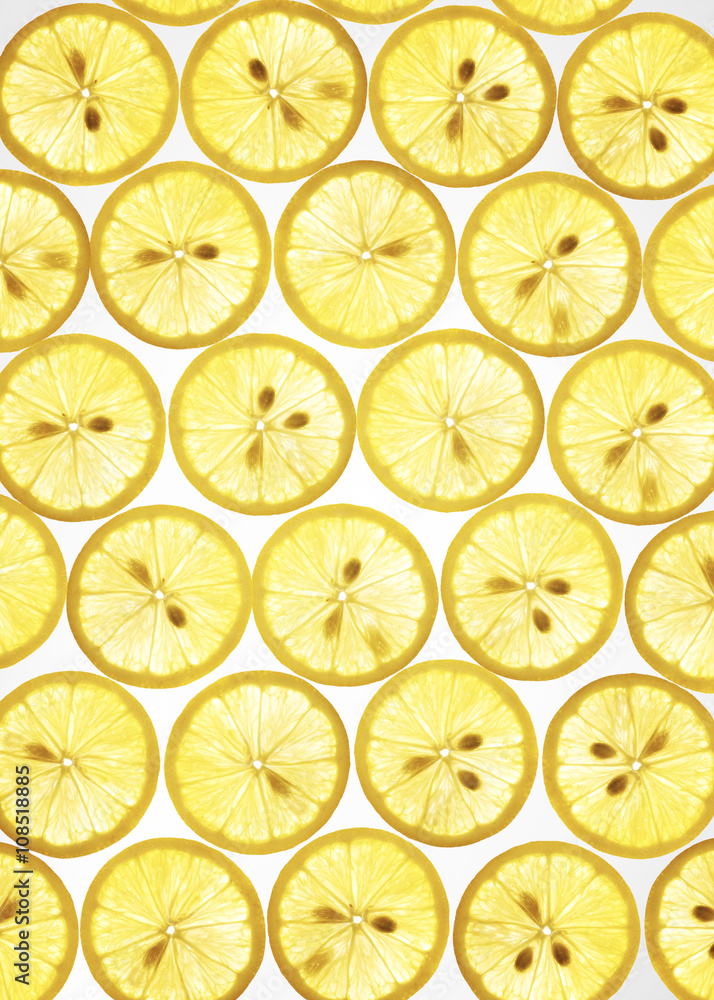 Many rings Lemon on white background , back lit . Many rings Lemon on white background , back lit .