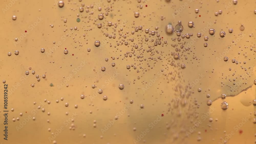 Effervescent mix of oil, water and colorful ink. Moving bubbles Effervescent mix of oil, water and colorful ink. Moving bubbles