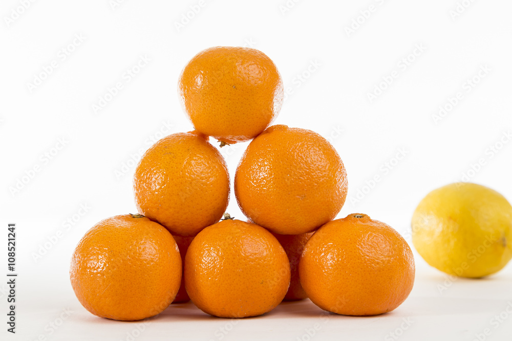 Bright Orange Clementines on a bright background Bright Orange Clementines on a bright background