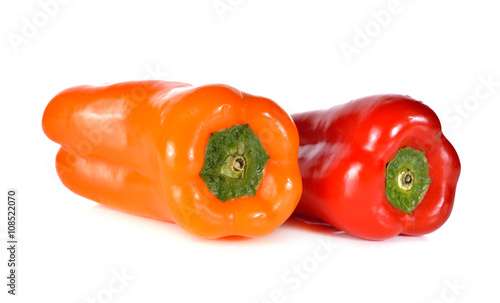 fresh Aura sweet red and orange pepper on white background