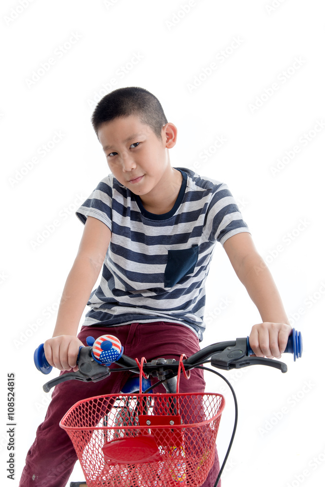 Asian schoolboy with backpack riding a bike isolated on white ba Asian schoolboy with backpack riding a bike isolated on white ba