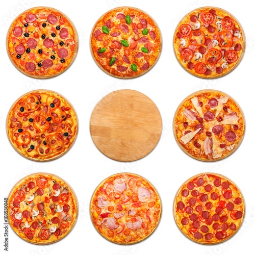 Pizza set with wooden desk copyspace isolated