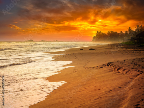 Ocean sunset at sea beach © Dmitry Rukhlenko