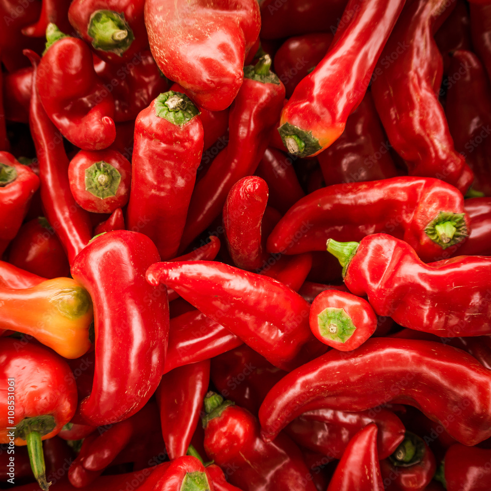 Red chili pepper background. many red peppers Red chili pepper background. many red peppers