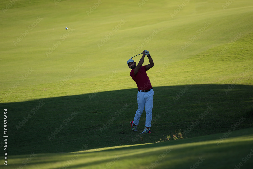 golf player hitting long shot golf player hitting long shot