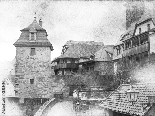 Black and white cityscape of the medieval town with gates tower. Rothenburg, Bavaria, Germany.