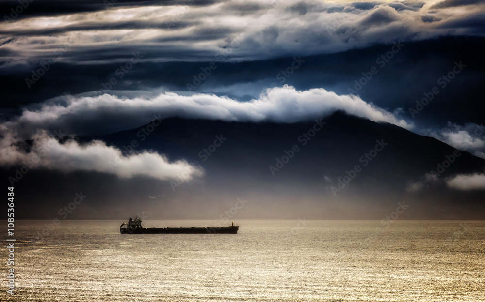 cargo ship with stormy weather