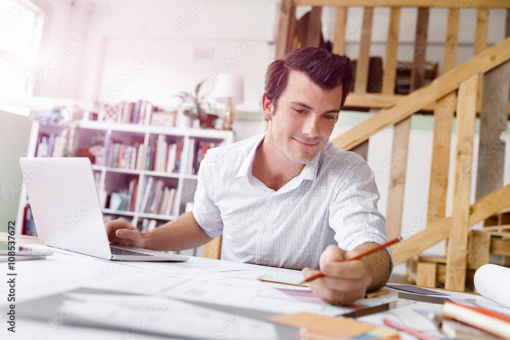 Male architect in office