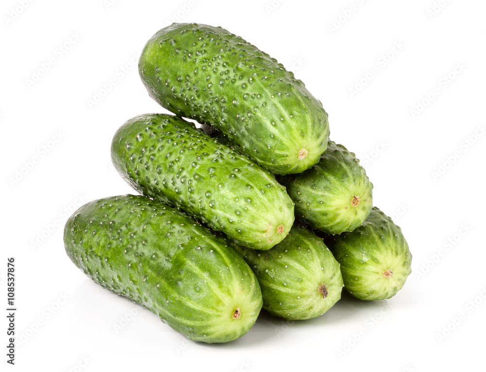 heap of cucumbers isolated on white background heap of cucumbers isolated on white background