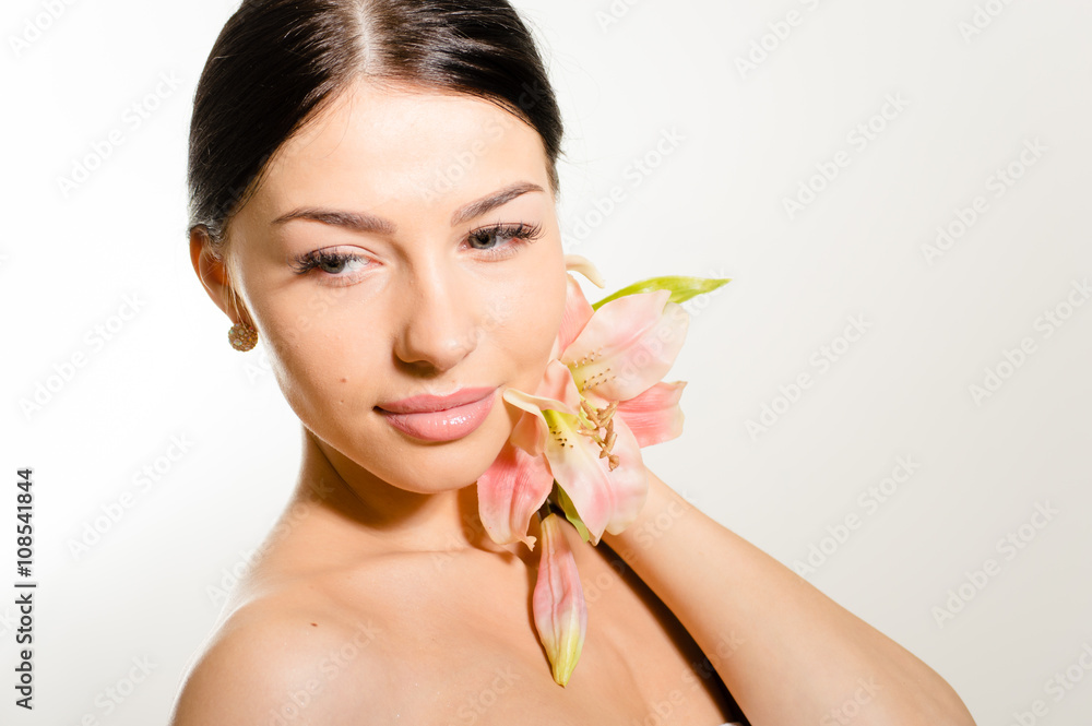 Beautiful lady with lilly flower. Perfect skin. Beautiful lady with lilly flower. Perfect skin.