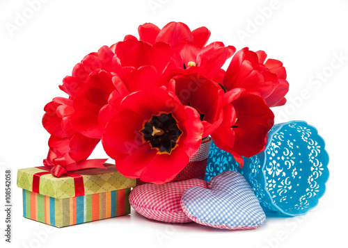 Basket with tulips and gift isolated