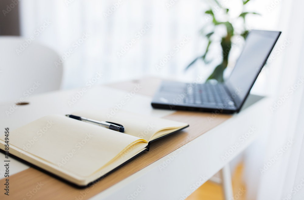 notebook and laptop computer on office table notebook and laptop computer on office table