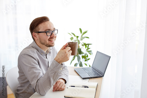 creative man or businessman drinking coffee