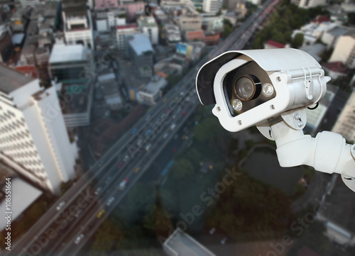 CCTV with Blurring City background.