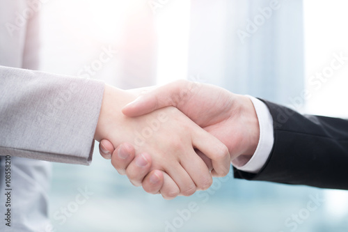 success business people shake hands