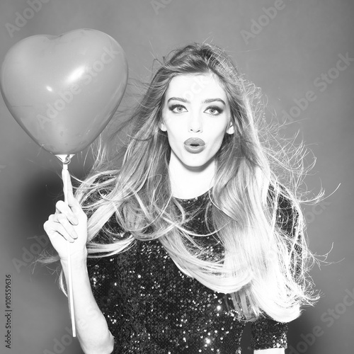 Emotional sexy woman with balloon