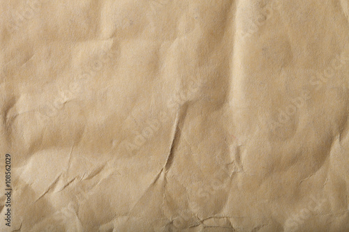 Textured surface of old baking paper photo