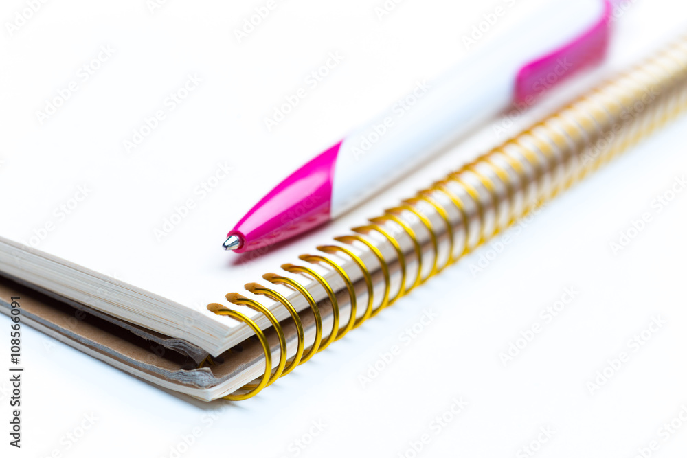 Pen and notebook close up Pen and notebook close up