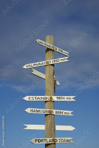 Sign post on the coast of Easter Island showing the distance to various cities around the world. © JeremyRichards