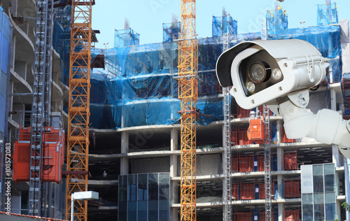 CCTV with Blurring Building construction background.